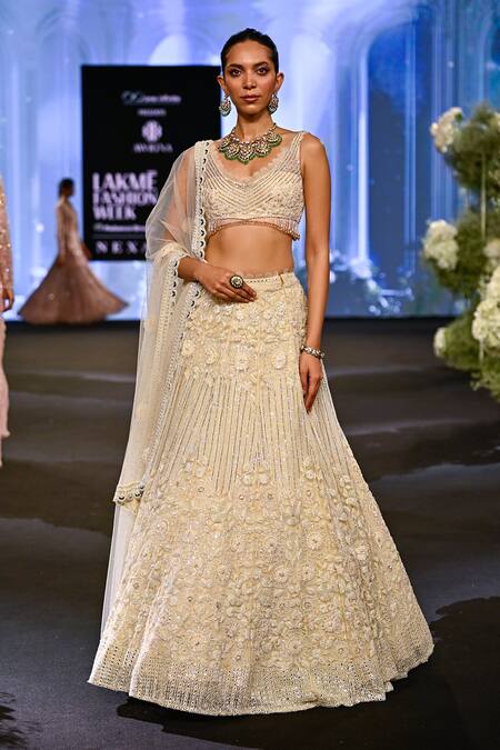 Awigna_Ivory Net, Silk Beads, Sequins, Cut Work Belgium Daisy Embroidered Lehenga Set _at_Aza_Fashions