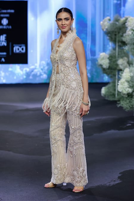 Shop_Awigna_Ivory Net, Polyester Crystals, Ukraine Fiore Embroidered Peplum Jacket With Pant _Online_at_Aza_Fashions