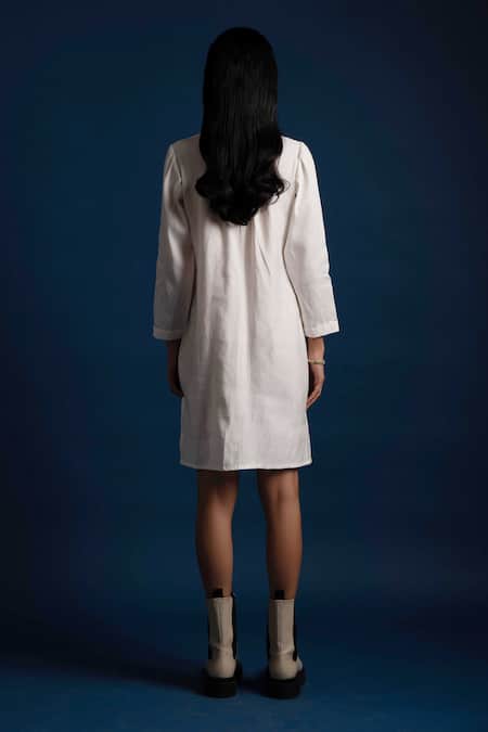 Shop Khajoor Studio White Linen Beads Round Neck Candle Short Pocket Dress at Aza Fashions Shop_Khajoor Studio_White Linen Beads Round Neck Candle Short Pocket Dress _at_Aza_Fashions