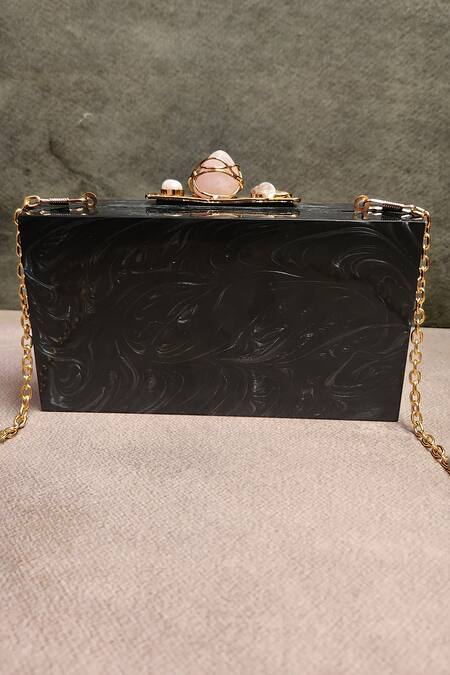 Shop Adwita Bags & Jewels Black Stone Theos Carved Metal Embellished Clutch Bag at Aza Fashions Shop_Adwita Bags & Jewels_Black Stone Theos Carved Metal Embellished Clutch Bag _at_Aza_Fashions