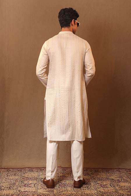 Shop MATI_1 Off White Cotton Metallic Thread Handwoven Striped Straight Kurta at Aza Fashions Shop_MATI_1_Off White Cotton Metallic Thread Handwoven Striped Straight Kurta _at_Aza_Fashions