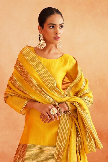 Palak & Mehak_Yellow Chanderi Zari Round Neck Adiva Striped Hem Kurta Wide Leg Pant Set _at_Aza_Fashions