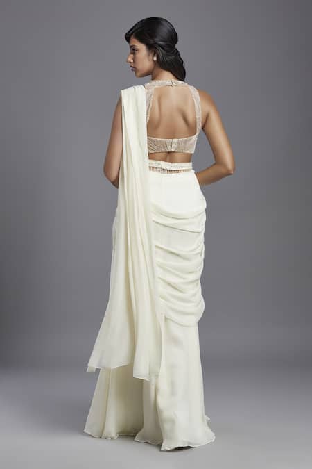 Shop Maisolos Ivory Georgette, Net Beads, Embroidery, Sequins Pre-draped Saree With Blouse at Aza Fashions Shop_Maisolos_Ivory Georgette, Net Beads, Embroidery, Sequins Pre-draped Saree With Blouse _at_Aza_Fashions