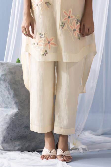 Buy Oja Ivory Cotton Embroidery, Sequins Collared Floral High-low Tunic With Pant Online at Aza Fashions Buy_Oja_Ivory Cotton Embroidery, Sequins Collared Floral High-low Tunic With Pant _Online_at_Aza_Fashions