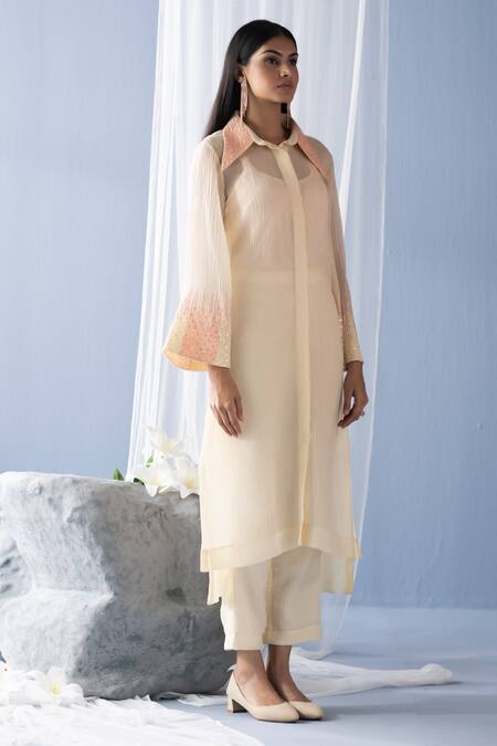 Buy_Oja_Ivory Cotton Sequins, Embroidery Collared Placed High-low Tunic With Pant _Online_at_Aza_Fashions
