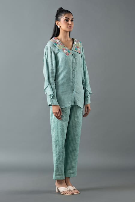 Oja Blue Linen Mirrors, Sequins, Embroidery Collared Ruffle Sleeve Top And Pant Set Online at Aza Fashions Oja_Blue Linen Mirrors, Sequins, Embroidery Collared Ruffle Sleeve Top And Pant Set _Online_at_Aza_Fashions