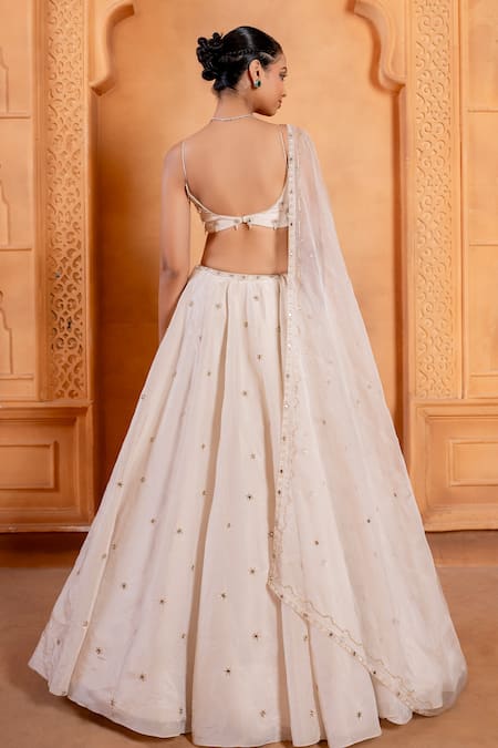 Shop Enamour By Radha Ivory Silk, Organza Sequins, Zari Plunge Zardosi Embroidered Flared Lehenga Set at Aza Fashions Shop_Enamour By Radha_Ivory Silk, Organza Sequins, Zari Plunge Zardosi Embroidered Flared Lehenga Set _at_Aza_Fashions
