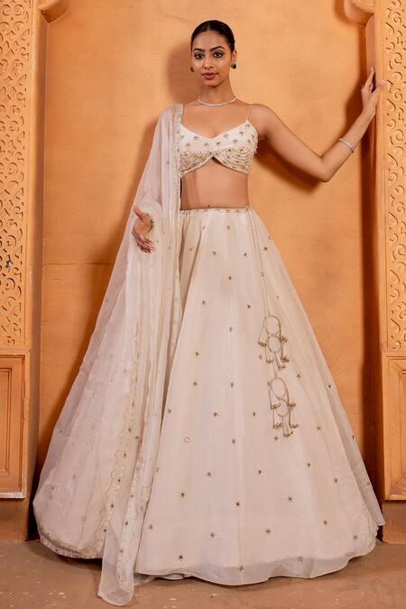 Shop Enamour By Radha Ivory Silk, Organza Sequins, Zari Plunge Zardosi Embroidered Flared Lehenga Set Online at Aza Fashions Shop_Enamour By Radha_Ivory Silk, Organza Sequins, Zari Plunge Zardosi Embroidered Flared Lehenga Set _Online_at_Aza_Fashions