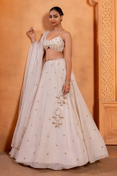 Enamour By Radha Ivory Silk, Organza Sequins, Zari Plunge Zardosi Embroidered Flared Lehenga Set at Aza Fashions Enamour By Radha_Ivory Silk, Organza Sequins, Zari Plunge Zardosi Embroidered Flared Lehenga Set _at_Aza_Fashions