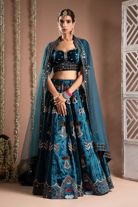 Ahi Clothing Blue Velvet, Net, Hemp Mirrors, Embroidery, Zari Asymmetric Zardozi Lehenga Set Online at Aza Fashions Ahi Clothing_Blue Velvet, Net, Hemp Mirrors, Embroidery, Zari Asymmetric Zardozi Lehenga Set _Online_at_Aza_Fashions