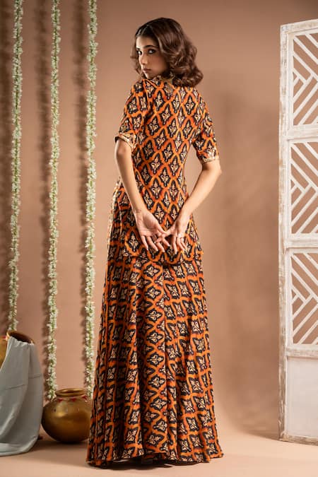 Shop Ahi Clothing Brown Crepe Embroidery, Mirrors, Floral Jaal Print Cut-out Kurta Palazzo Set at Aza Fashions Shop_Ahi Clothing_Brown Crepe Embroidery, Mirrors, Floral Jaal Print Cut-out Kurta Palazzo Set _at_Aza_Fashions