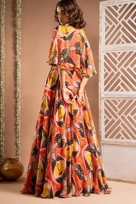 Shop Ahi Clothing Orange Georgette Embroidery, Cut Work, Zari Floral Print Cape Lehenga Set at Aza Fashions Shop_Ahi Clothing_Orange Georgette Embroidery, Cut Work, Zari Floral Print Cape Lehenga Set _at_Aza_Fashions