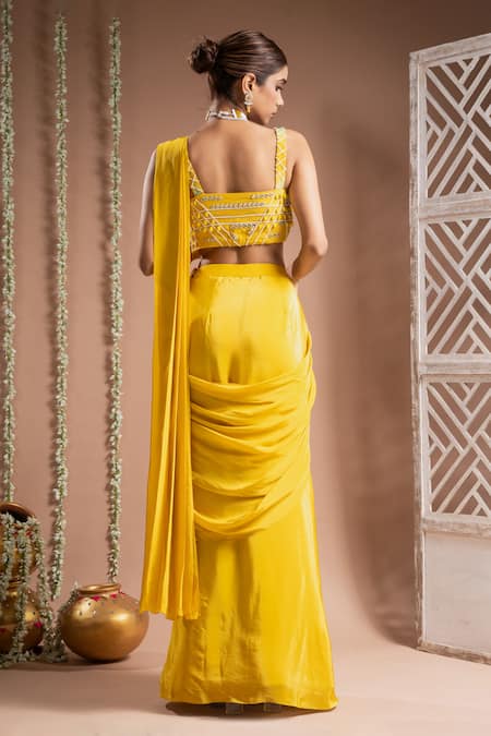 Shop Ahi Clothing Yellow Crepe, Linen Sequins, Solid Pre-draped Saree With Embroidered Bustier at Aza Fashions Shop_Ahi Clothing_Yellow Crepe, Linen Sequins, Solid Pre-draped Saree With Embroidered Bustier _at_Aza_Fashions