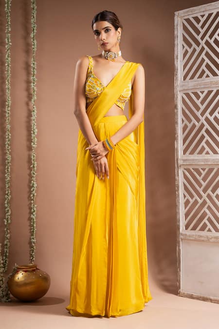 Ahi Clothing Yellow Crepe, Linen Sequins, Solid Pre-draped Saree With Embroidered Bustier Online at Aza Fashions Ahi Clothing_Yellow Crepe, Linen Sequins, Solid Pre-draped Saree With Embroidered Bustier _Online_at_Aza_Fashions