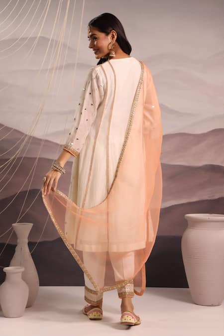 Shop Omi Off White Chanderi Embroidered Mirror Notched Sana Work Kurta Pant Set at Aza Fashions Shop_Omi_Off White Chanderi Embroidered Mirror Notched Sana Work Kurta Pant Set _at_Aza_Fashions