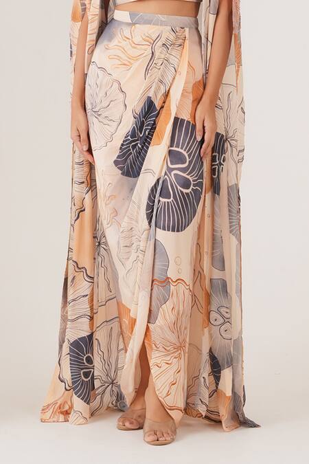 Label Shristi Chetani_Peach Natural Crepe Embellished Bead Cape Open Abstract Motif Draped Skirt Set _Online_at_Aza_Fashions