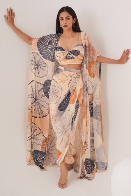 Shop_Label Shristi Chetani_Peach Natural Crepe Embellished Bead Cape Open Abstract Motif Draped Skirt Set _Online_at_Aza_Fashions