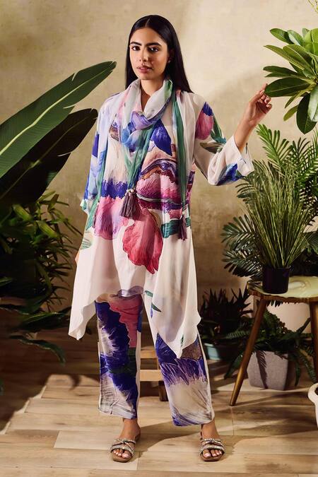 Shop Rainas White Viscose, Chiffon, Crepe Tassels Floral Print Asymmetric Kurta Pant Set Online at Aza Fashions Shop_Rainas_White Viscose, Chiffon, Crepe Tassels Floral Print Asymmetric Kurta Pant Set _Online_at_Aza_Fashions