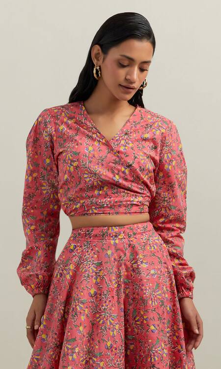 Shikha Malik Peach Cotton Embroidery V-neck Floral Print Wrapped Top With Skirt at Aza Fashions Shikha Malik_Peach Cotton Embroidery V-neck Floral Print Wrapped Top With Skirt _at_Aza_Fashions