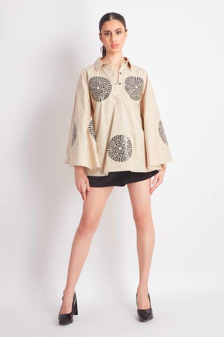 Richaa Goenka Beige Cotton Applique Leather Cutwork Collared Neck Cape Shirt Online at Aza Fashions Richaa Goenka_Beige Cotton Applique Leather Cutwork Collared Neck Cape Shirt _Online_at_Aza_Fashions