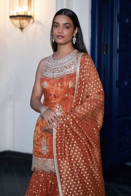 Buy Basanti - Kapde Aur Koffee Orange Tissue Sequins Round Neck Floral Embroidered Kurta Sharara Set Online at Aza Fashions Buy_Basanti - Kapde Aur Koffee_Orange Tissue Sequins Round Neck Floral Embroidered Kurta Sharara Set_Online_at_Aza_Fashions