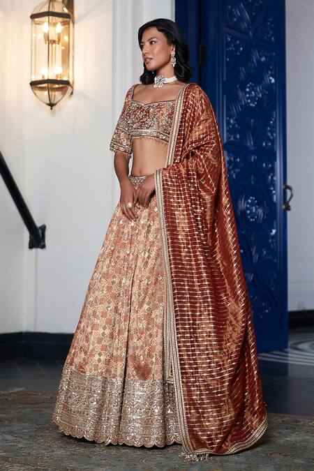 Basanti - Kapde Aur Koffee_Orange Brocade Sequins, Cut Work, Mirrors Embroidered Hem Lehenga Blouse Set_at_Aza_Fashions