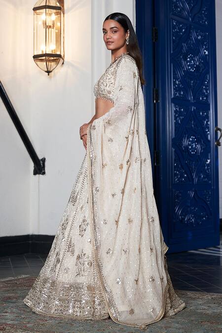 Basanti - Kapde Aur Koffee_Ivory Organza, Tissue Sequins, Embroidery, Cut Work V-neck Floral Lehenga Set_at_Aza_Fashions