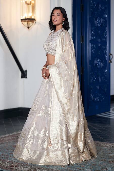 Shop_Basanti - Kapde Aur Koffee_Ivory Organza Cut Work, Sequins, Mirrors Halter Neck Woven Floral Lehenga Set_Online_at_Aza_Fashions