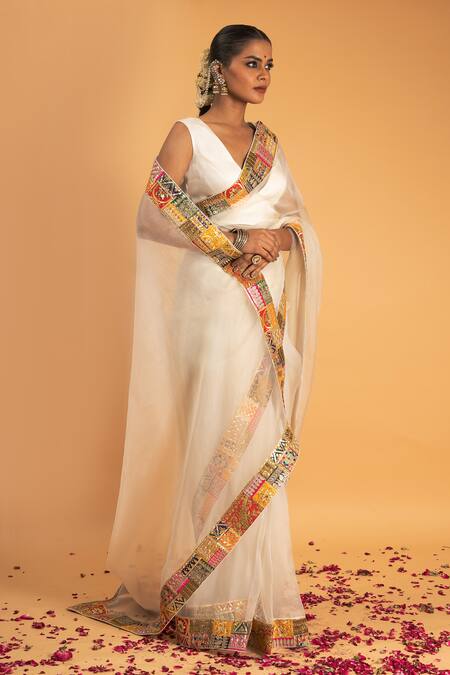 Sitaraa_Ivory Organza, Modal, Satin Naaz Applique Border Embroidered Saree With Blouse_Online_at_Aza_Fashions