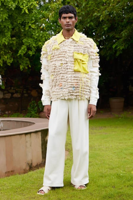 Shop Triune Ivory Handwoven Cotton Embellished Tassels Sandearlings Layered Cargo Jacket at Aza Fashions Shop_Triune_Ivory Handwoven Cotton Embellished Tassels Sandearlings Layered Cargo Jacket_at_Aza_Fashions