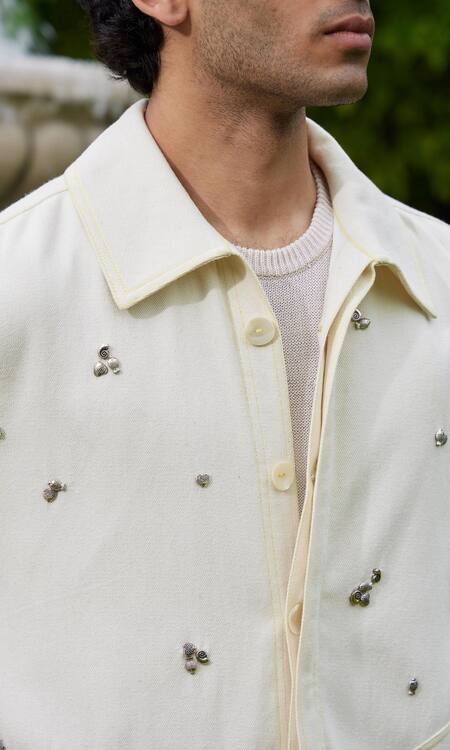 Buy_Triune_White Cotton Embellished Metal Studs Sand Beach Blouson Jacket _Online_at_Aza_Fashions