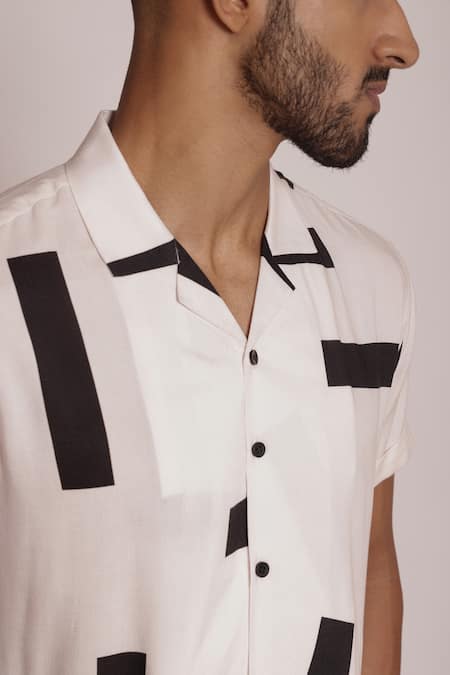Lacquer Embassy Ivory Rayon Abstract Motif Print Camp Collar Half Sleeve Shirt at Aza Fashions Lacquer Embassy_Ivory Rayon Abstract Motif Print Camp Collar Half Sleeve Shirt _at_Aza_Fashions