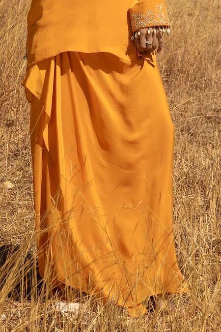 Islie By Priya Jain Orange Crepe Sequins, Zari V-neck Zardozi Neckline Embroidered Kurta And Skirt Set Online at Aza Fashions Islie By Priya Jain_Orange Crepe Sequins, Zari V-neck Zardozi Neckline Embroidered Kurta And Skirt Set _Online_at_Aza_Fashions