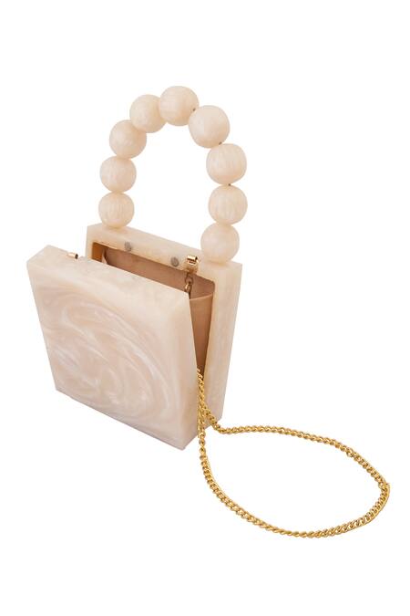 Buy Boxwish By Bhumika Ivory Pearls Handle Resin Clutch Online at Aza Fashions Buy_Boxwish By Bhumika_Ivory Pearls Handle Resin Clutch _Online_at_Aza_Fashions