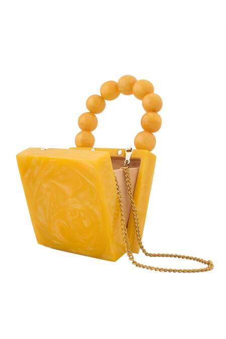 Buy Boxwish By Bhumika Yellow Pearls Handle Swerve Texture Resin Clutch Bag Online at Aza Fashions Buy_Boxwish By Bhumika_Yellow Pearls Handle Swerve Texture Resin Clutch Bag _Online_at_Aza_Fashions