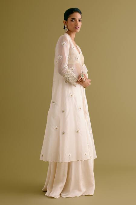 Devnaagri Ivory Organza, Satin Pearls, Sequins Embroidered Jacket Sharara Set Online at Aza Fashions Devnaagri_Ivory Organza, Satin Pearls, Sequins Embroidered Jacket Sharara Set _Online_at_Aza_Fashions