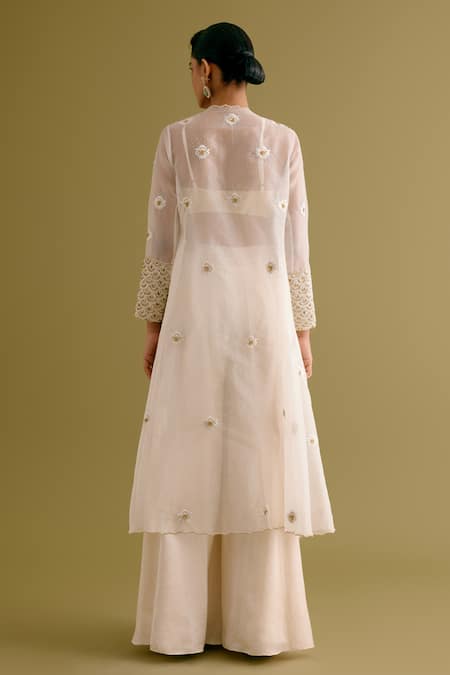 Shop Devnaagri Ivory Organza, Satin Pearls, Sequins Embroidered Jacket Sharara Set at Aza Fashions Shop_Devnaagri_Ivory Organza, Satin Pearls, Sequins Embroidered Jacket Sharara Set _at_Aza_Fashions