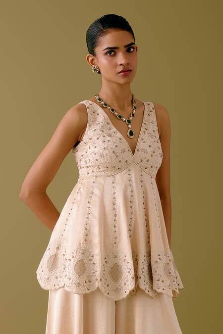 Shop_Devnaagri_Ivory Silk Satin, Net Pearls, Sequins, Zari V-neck Work Kurta Sharara Set _Online_at_Aza_Fashions