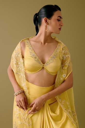 Devnaagri_Yellow Organza, Satin Blossom Dori And Sequin Cape & Draped Skirt Set _at_Aza_Fashions