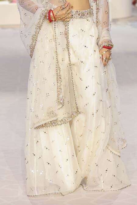 Payal Singhal Ivory Muslin Embroidery, Mirrors, Shakira Blouse Mukaish Work Sharara Set Online at Aza Fashions Payal Singhal_Ivory Muslin Embroidery, Mirrors, Shakira Blouse Mukaish Work Sharara Set _Online_at_Aza_Fashions