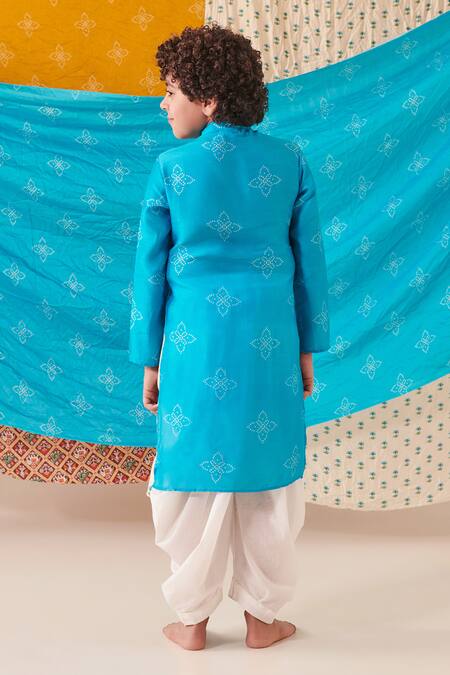 Shop Cute Couture Blue Silk Print Bandhani And Bloom Flap Kurta With Dhoti Pant at Aza Fashions Shop_Cute Couture_Blue Silk Print Bandhani And Bloom Flap Kurta With Dhoti Pant _at_Aza_Fashions