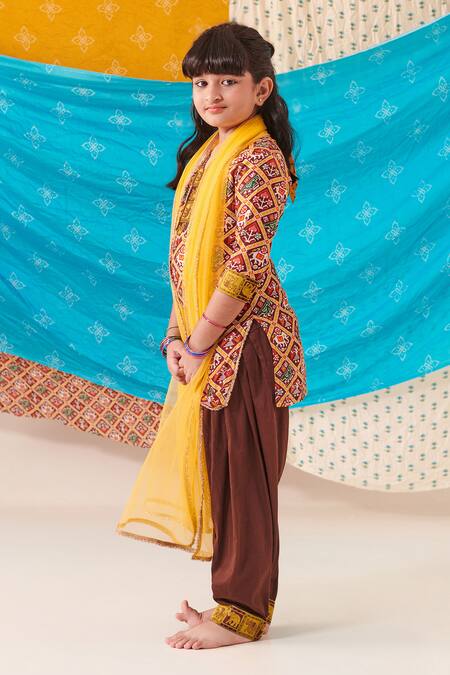 Buy Cute Couture Brown Muslin Silk Print Folklore Kurta And Patola Pant Set Online at Aza Fashions Buy_Cute Couture_Brown Muslin Silk Print Folklore Kurta And Patola Pant Set _Online_at_Aza_Fashions