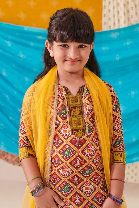 Shop Cute Couture Brown Muslin Silk Print Folklore Kurta And Patola Pant Set Online at Aza Fashions Shop_Cute Couture_Brown Muslin Silk Print Folklore Kurta And Patola Pant Set _Online_at_Aza_Fashions