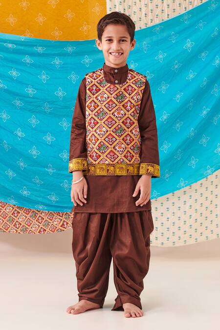Buy Cute Couture Brown Muslin Silk Print Folklore Kurta And Patola Pant Set Buy_Cute Couture_Brown Muslin Silk Print Folklore Kurta And Patola Pant Set