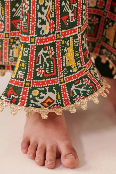 Cute Couture Green Muslin Silk Print Folklore Motif Patola Anarkali Set at Aza Fashions Cute Couture_Green Muslin Silk Print Folklore Motif Patola Anarkali Set _at_Aza_Fashions