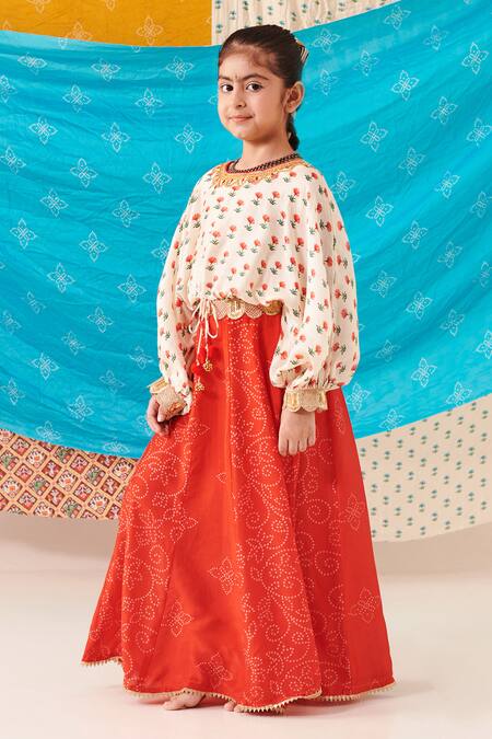 Cute Couture Red Silk Print Phool Top With Bandhani Bloom Lehenga Online at Aza Fashions Cute Couture_Red Silk Print Phool Top With Bandhani Bloom Lehenga _Online_at_Aza_Fashions