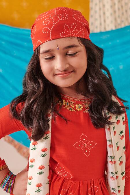 Cute Couture Red Muslin Silk Print Bandhani Bloom Peplum Kurti And Sharara Set Online at Aza Fashions Cute Couture_Red Muslin Silk Print Bandhani Bloom Peplum Kurti And Sharara Set _Online_at_Aza_Fashions