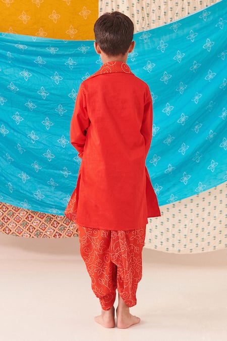 Shop Cute Couture Red Silk Embellished Placket Kurta And Floral Bandhani Print Dhoti Pant Set at Aza Fashions Shop_Cute Couture_Red Silk Embellished Placket Kurta And Floral Bandhani Print Dhoti Pant Set _at_Aza_Fashions