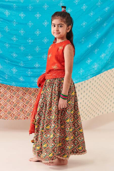 Shop Cute Couture Red Silk Print Phool Bloom Embroidered Top And Patola Lehenga Set Online at Aza Fashions Shop_Cute Couture_Red Silk Print Phool Bloom Embroidered Top And Patola Lehenga Set _Online_at_Aza_Fashions