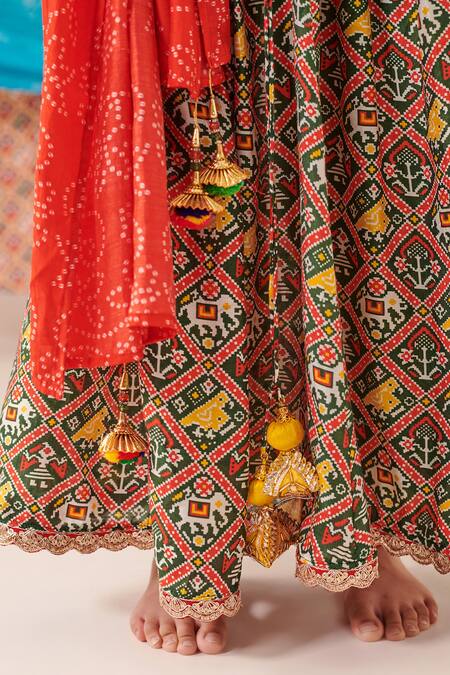 Buy Cute Couture Red Silk Print Phool Bloom Embroidered Top And Patola Lehenga Set Buy_Cute Couture_Red Silk Print Phool Bloom Embroidered Top And Patola Lehenga Set